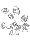 Coelhinho da Páscoa brinca com ovos de Páscoa
