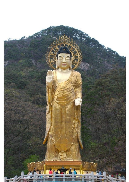 Foto estÃ¡tua de ouro de Maitreya 
