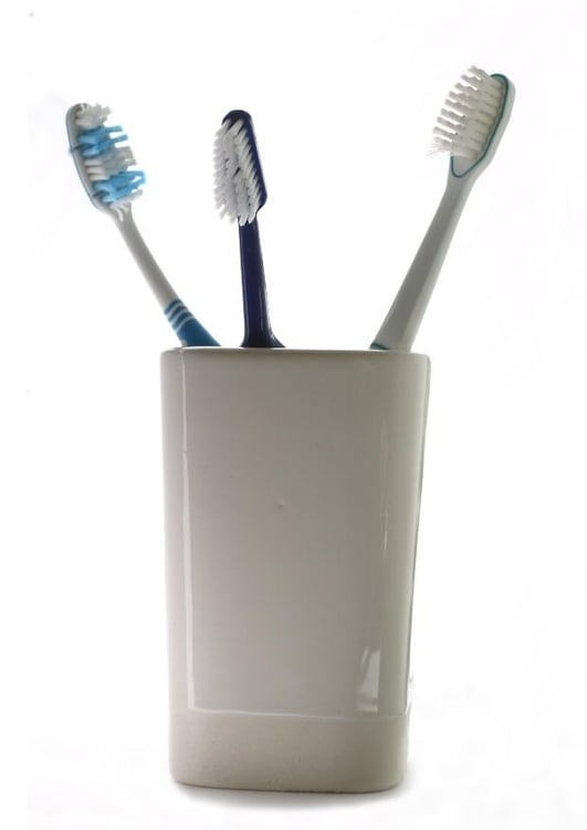Foto trÃªs escovas de dentes 